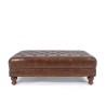 Repose-pieds capitonné en cuir véritable marron