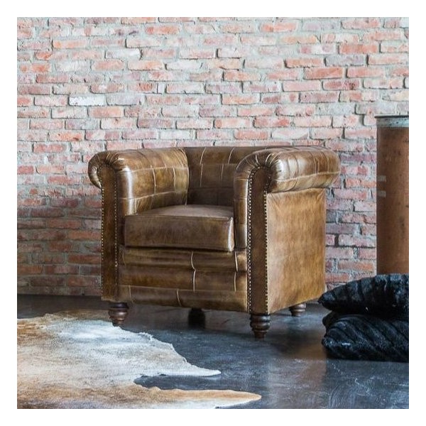 Fauteuil chesterfield en cuir patchwork