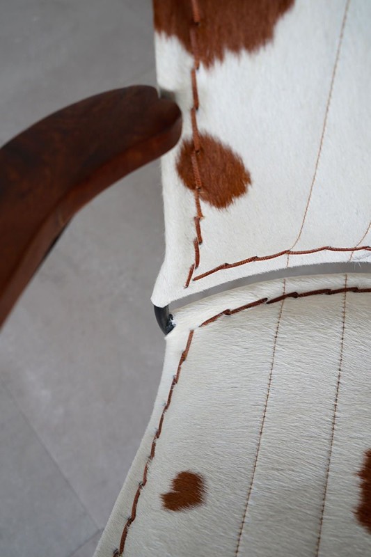 Fauteuil en peau de vache véritable brun/blanc